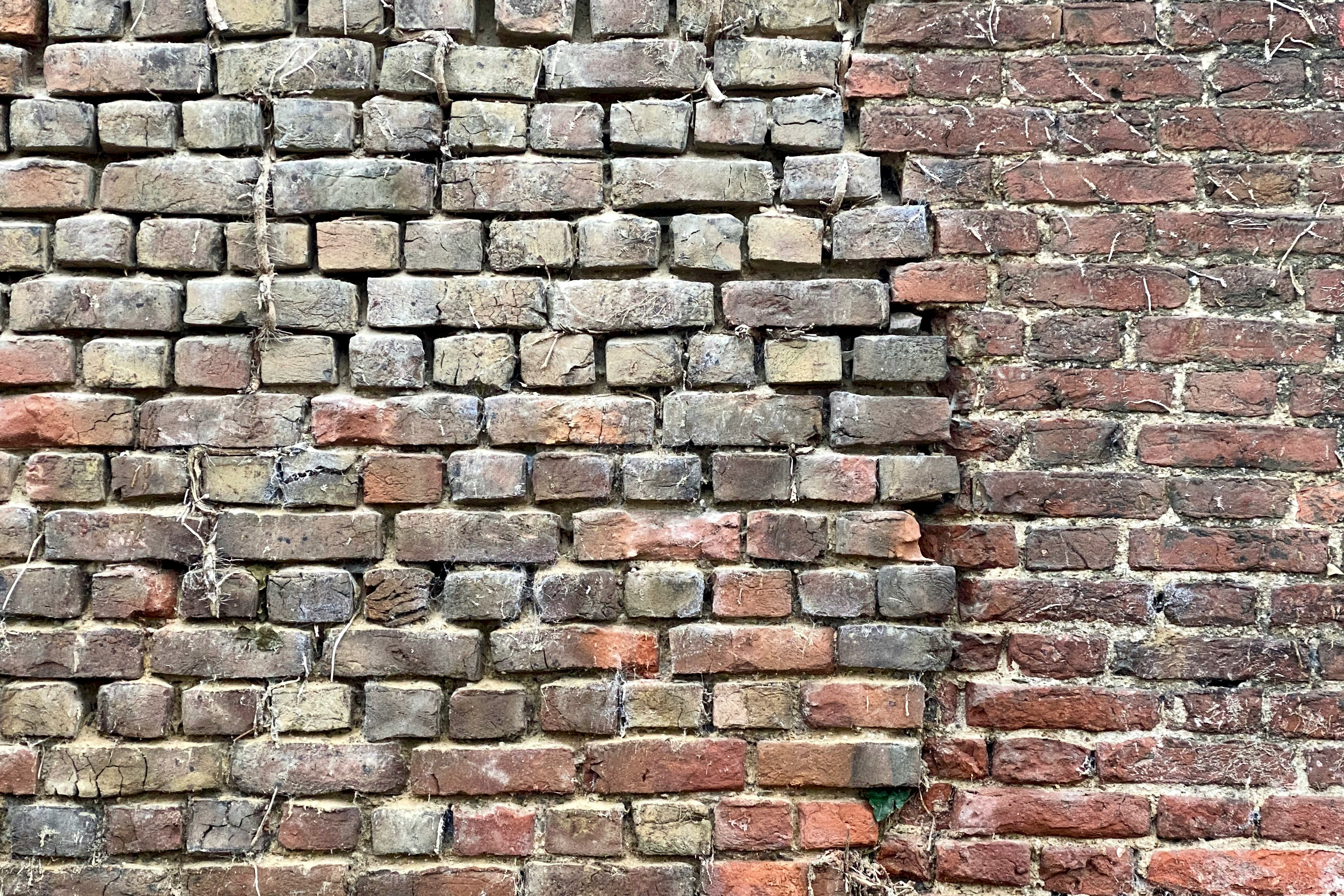 brown and gray brick wall